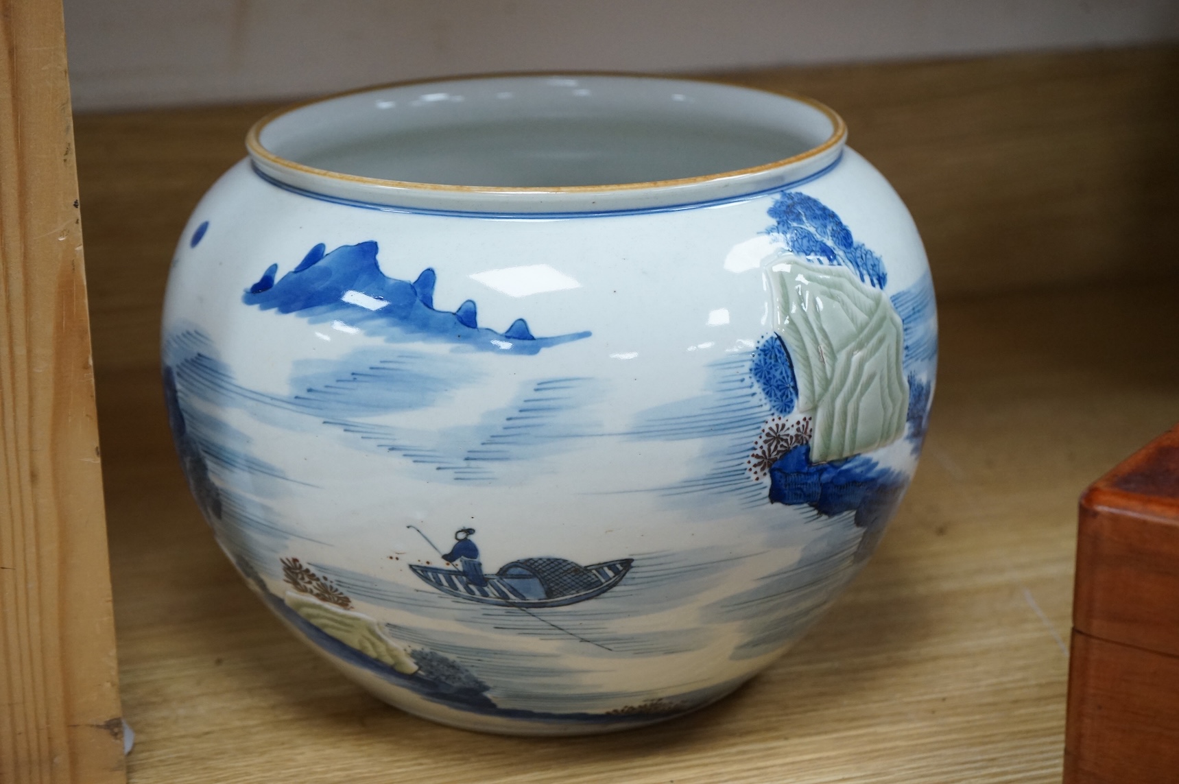 A Chinese blue and white and copper red jardiniere, 19cm